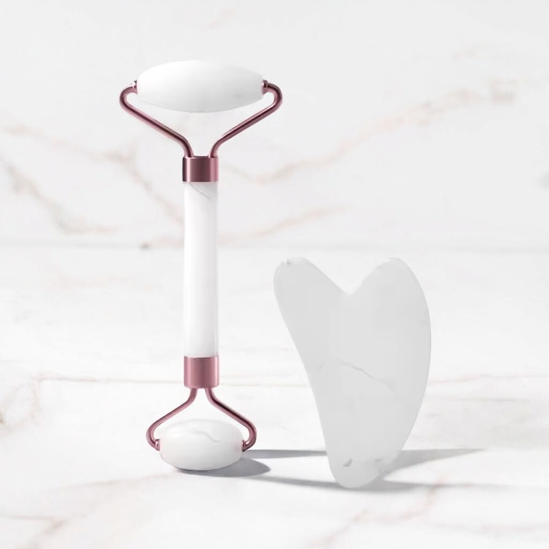Gua sha et rouleau visage blanc